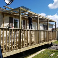 Doucette-Exteriors-White-Court-Alberta-Deck-Contractors-in-the-yard-with-fence-2