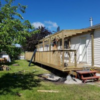 Doucette-Exteriors-White-Court-Alberta-Deck-in-the-yard-1