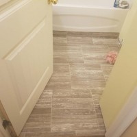 Doucette-Exteriors-White-Court-Alberta-bathroom-renovation-flooring