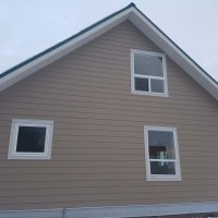 Doucette-Exteriors-White-Court-Alberta-beautiful-beige-siding-for-house-2