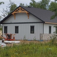 Doucette-Exteriors-White-Court-Alberta-contractors-for-siding-and-stone-accent-siding-3