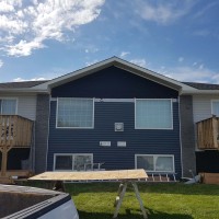 Doucette-Exteriors-White-Court-Alberta-contractors-in-perfect-siding-project